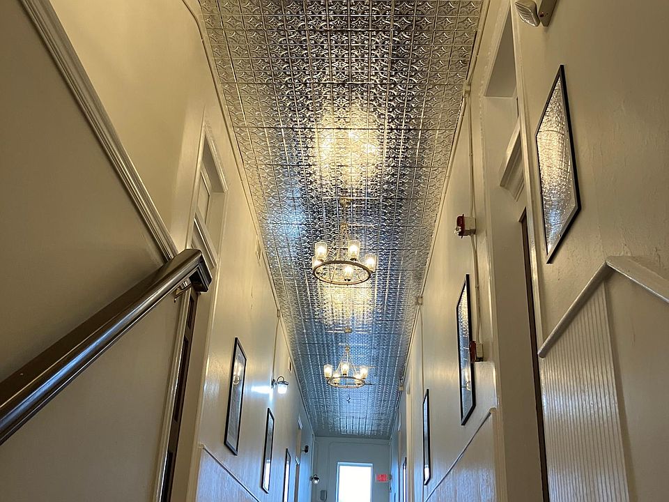 Loft hallway with historic timeline artwork