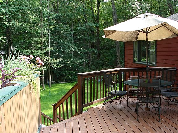 cedar deck and steps down to back yard