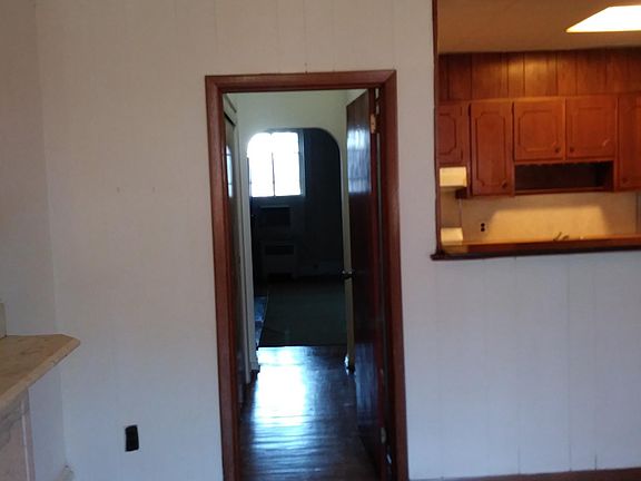 Living room facing bedroom(has door)