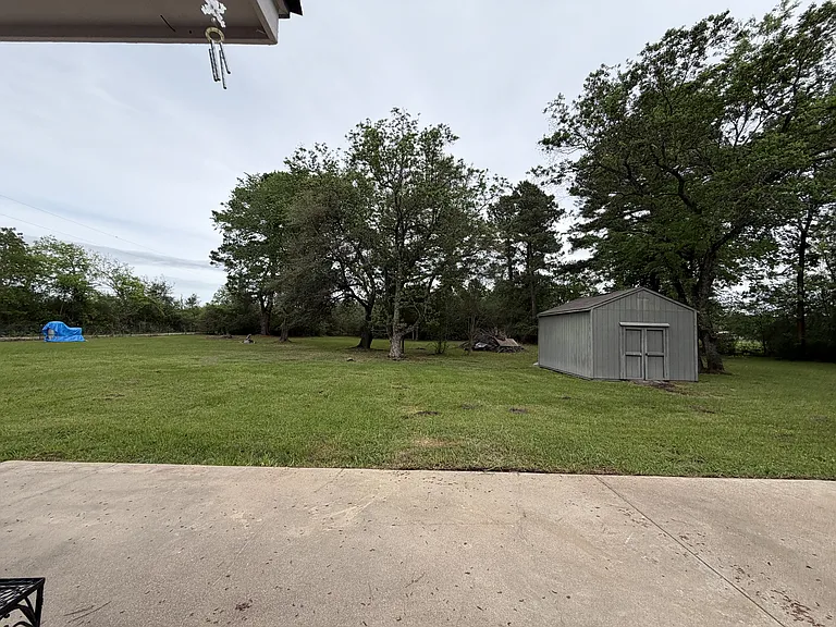 Large Backyard with Storage Shed