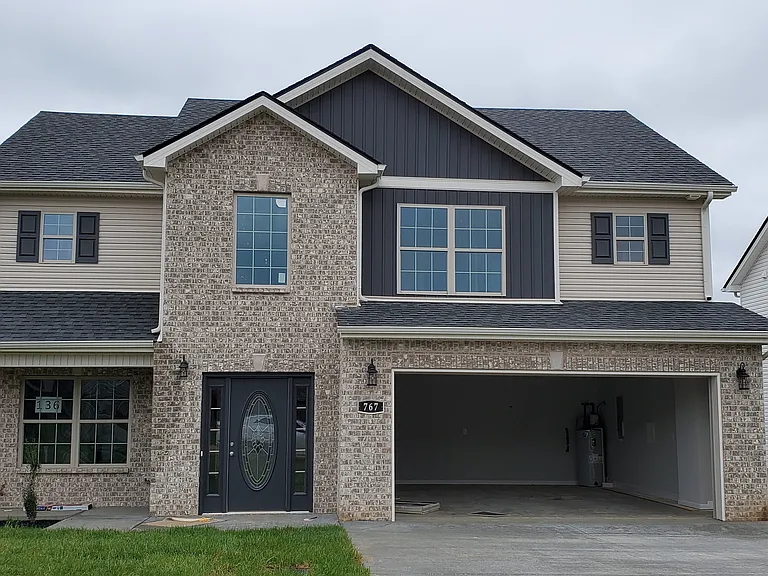Front of house showing inside of garage