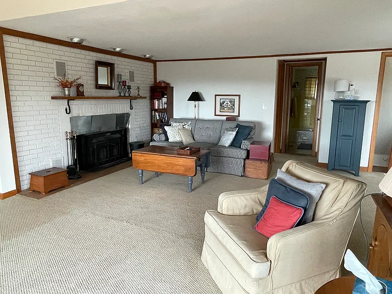 Living room with large wood stove