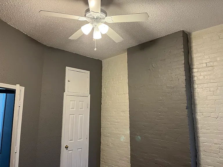 Exposed brick decor in bedroom #2