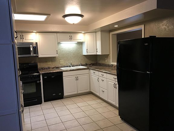 Kitchen with new dishwasher and pantry