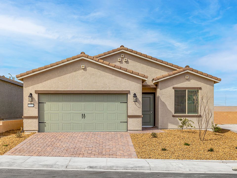 This home has beautiful stucco exterior and a two-car garage.
