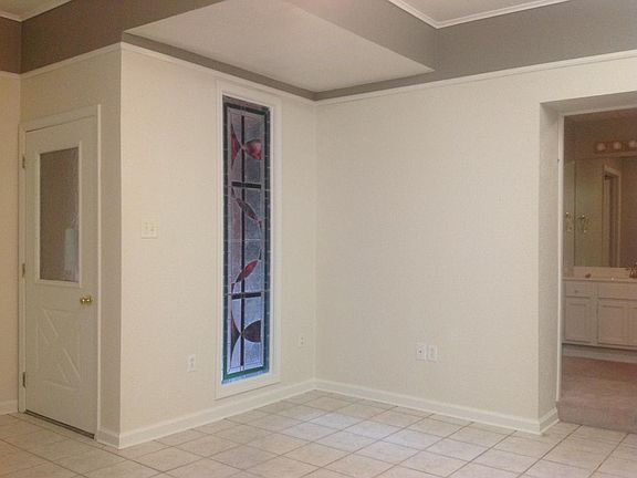 Downstairs Bedroom with Stained Glass