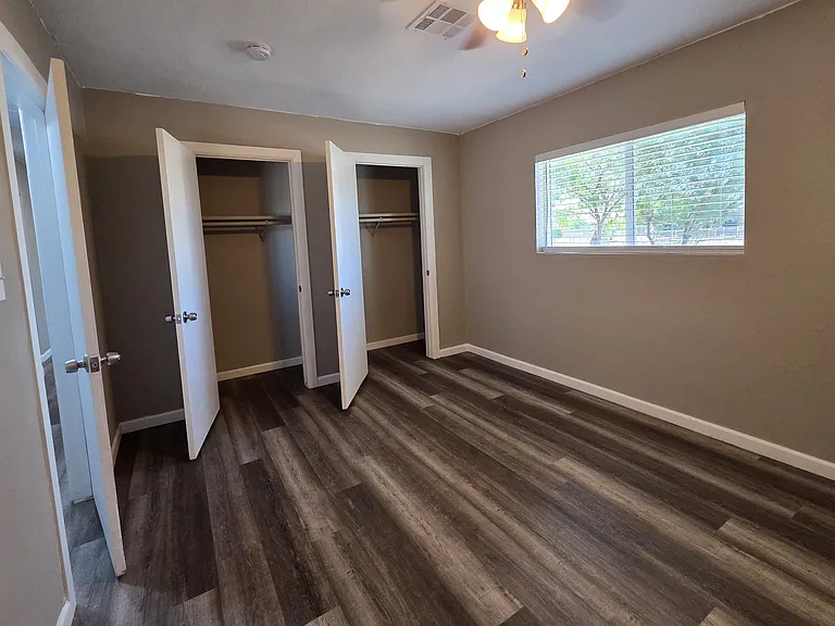 Master includes 2 closet door fo his and hers closet space. The closet is large and extends from one side of the wall to the other.