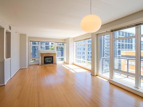 Living and dining area with balcony