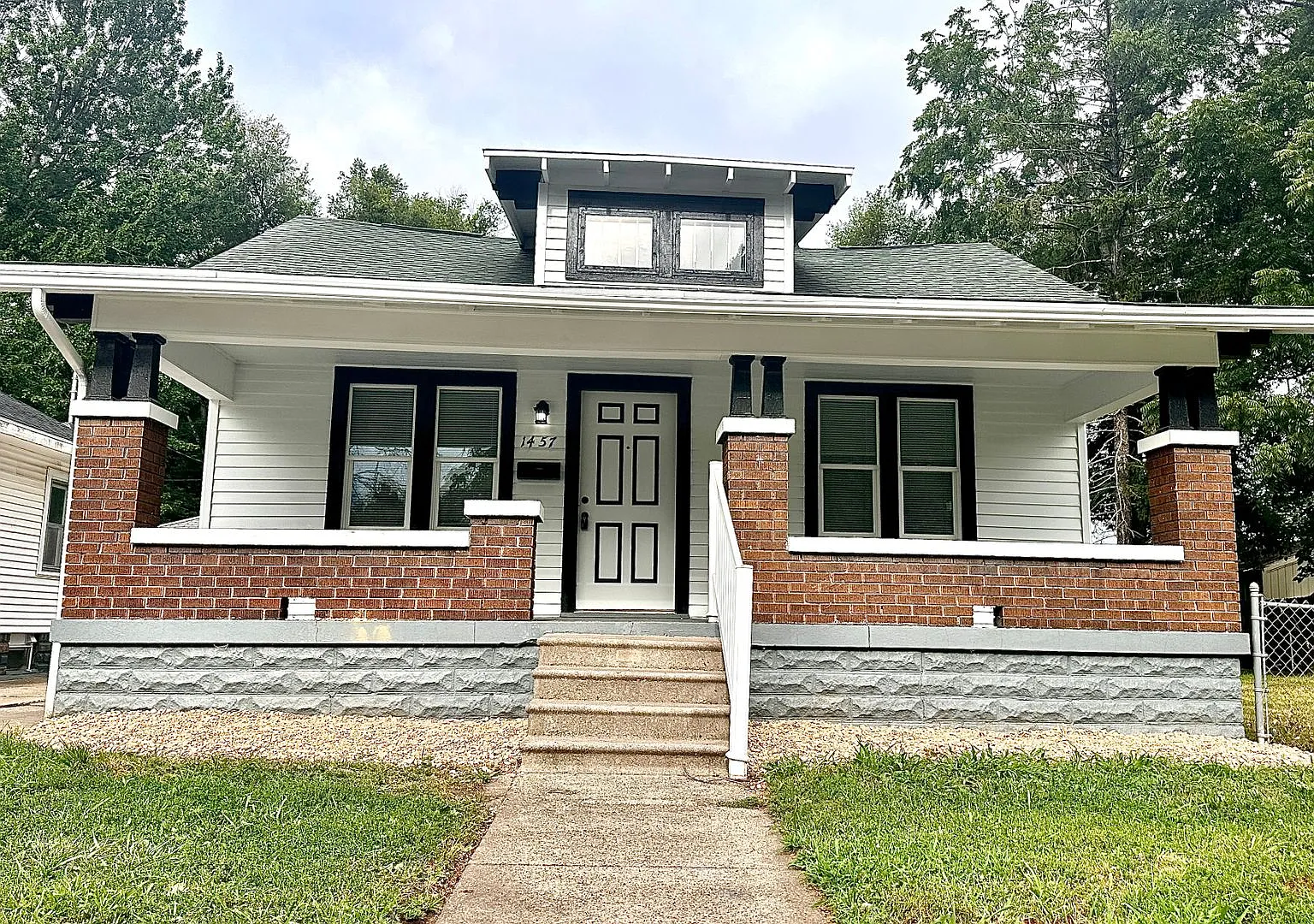 Historic Charm Meets Modern Living in this 2 bedroom Bungalow — Photo 1