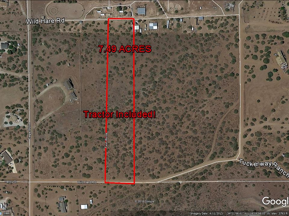 7.49 Acres. Tractor Included