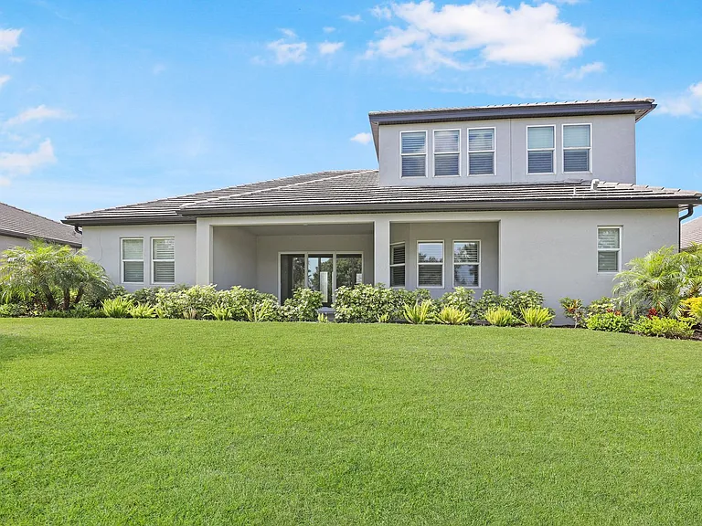 6133 Lungo Lago Dr — Photo 40