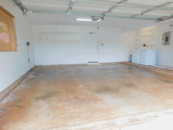Two-car garage with full-size washer and full size dryer. New water heater.