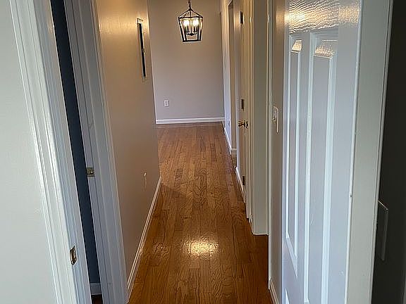 Hallway to bedrooms and bath
