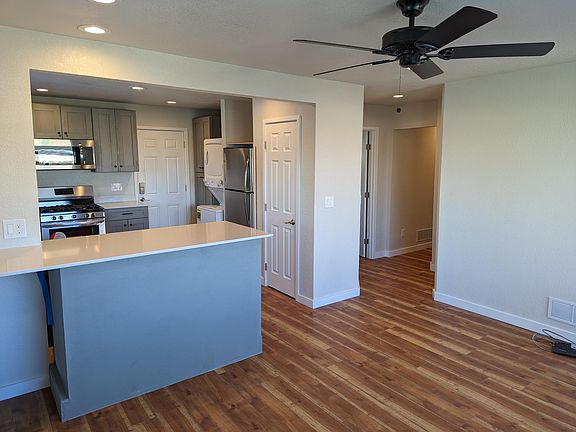 Living room facing hallway to bedrooms