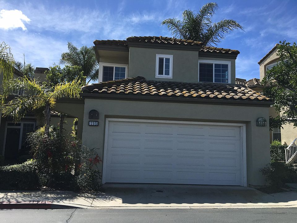 2 car garages with additional parking places in front