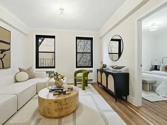 3rd image of 160 E 3rd St APT 2F