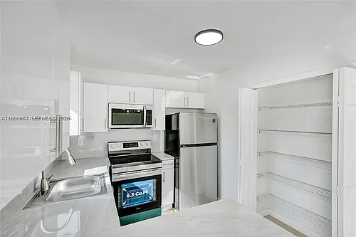 3398 NE 9th Dr #104 Photo 1