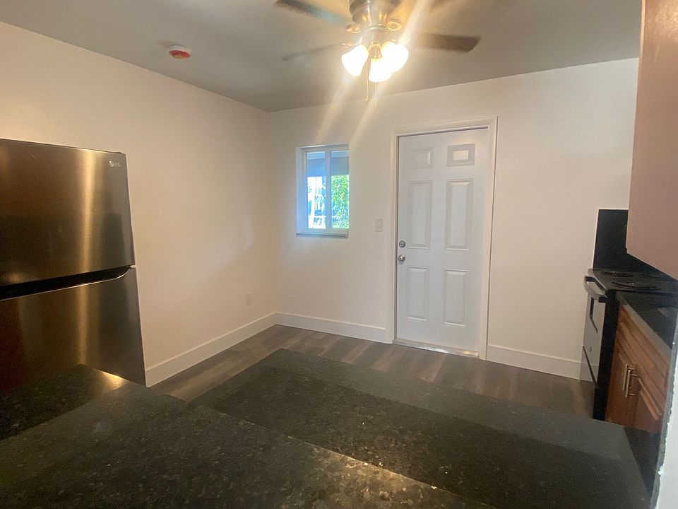 Kitchen second side, nook and rear door