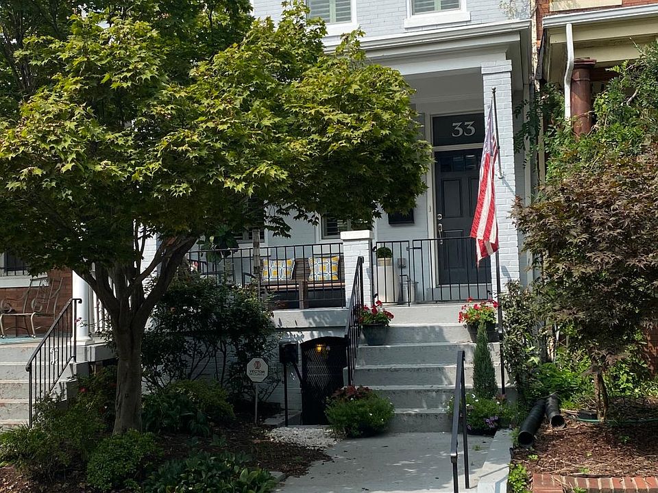 Front of House, basement entrance is below porch
