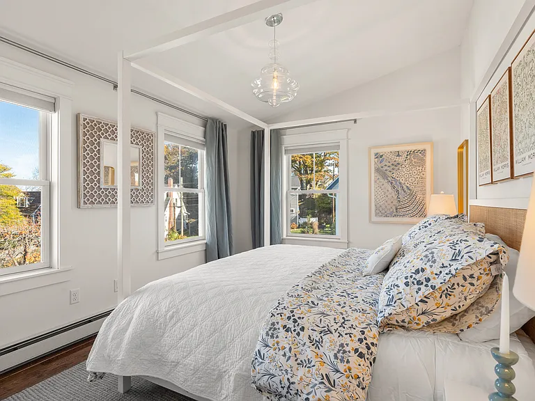 Sunny KING guest room features both black out shades and black out curtains.