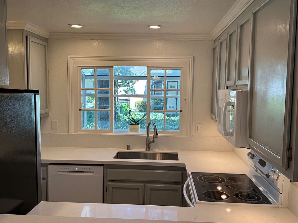 View of kitchen from bar
