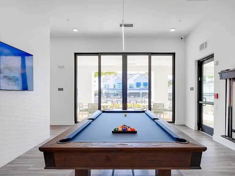 Imperial Crossing Luxury Apartment Homes community clubhouse billiards area.