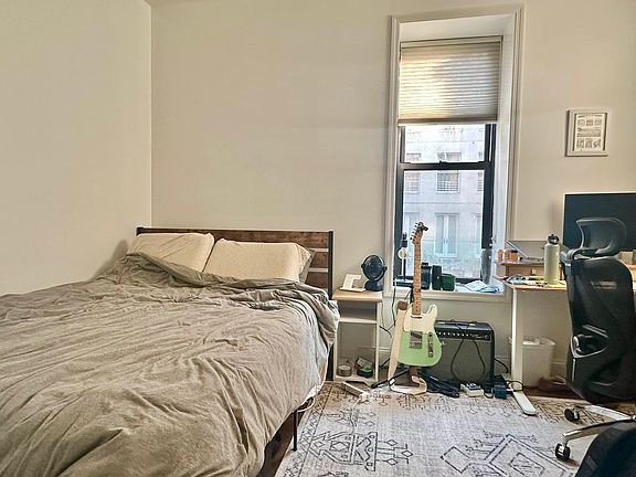 3rd image of 235 E 4th St APT 2E