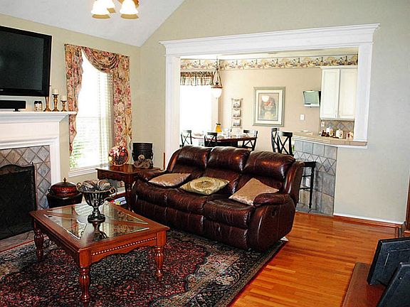The view of the family room looking into the breakfast area.