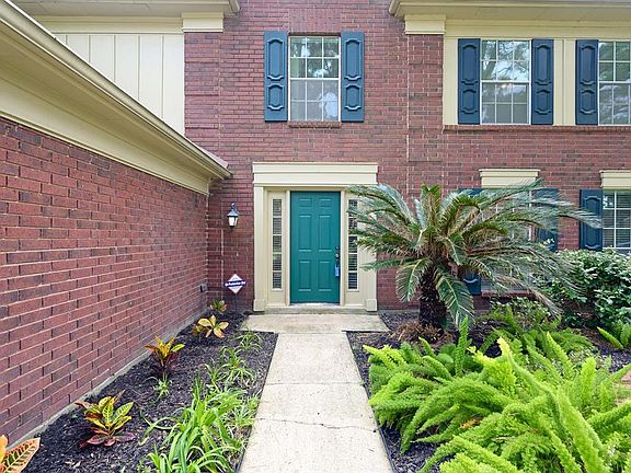 Beautiful landscaping is well-maintained and enhances this home's fantastic curb appeal.