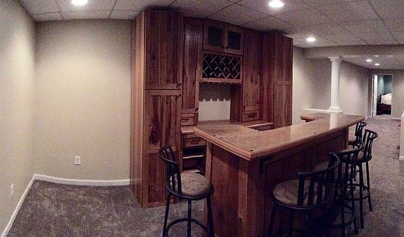 Fully finished basement : Includes bedroom, full bath, over 900 sq ft of open space, & lots of stora