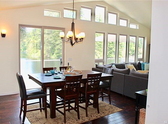 Dramatic open design with lots of windows bring the view inside.  Large dining area off kitchen and great room.  Step out the door to large deck that extends your living space outside.