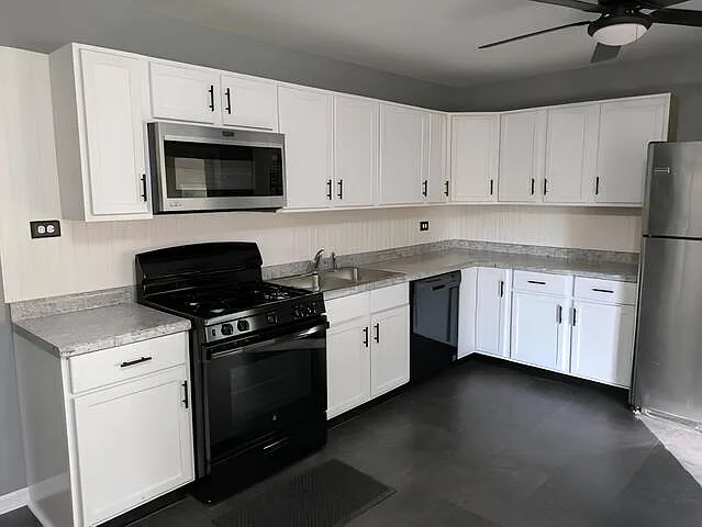 9407 Elm Ave — Photo 1