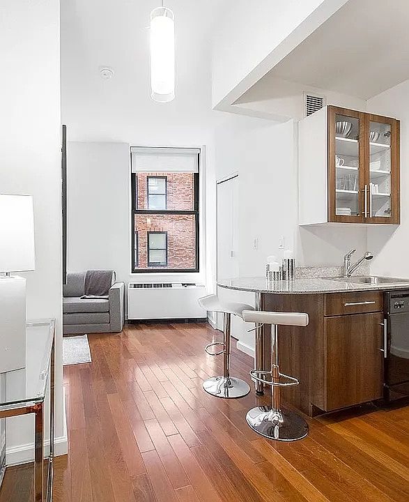 1st image of 1 Wall Street Ct #10-8