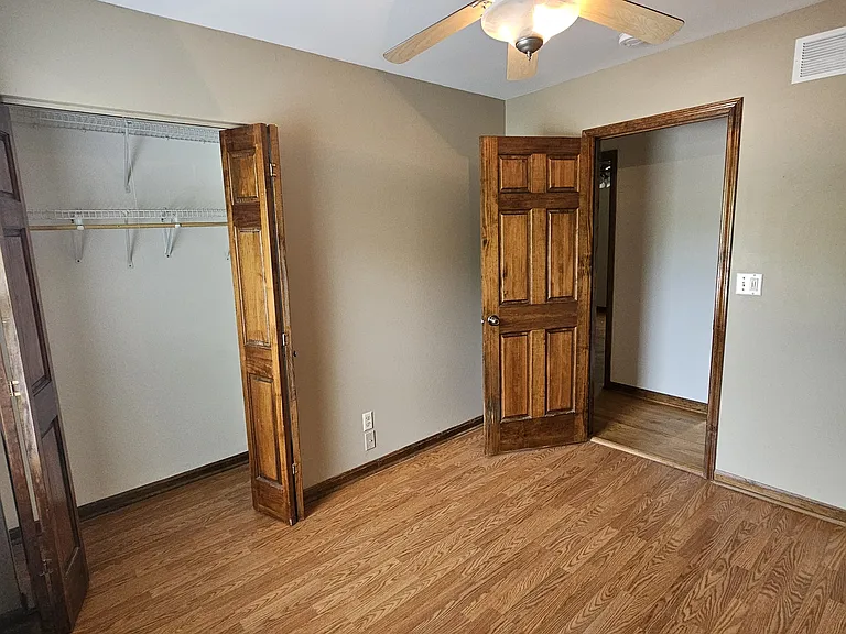 Bedroom #1 w/ closet and shelves