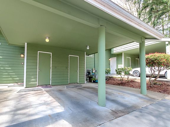 Carport plus extra parking space.
Storage unit.