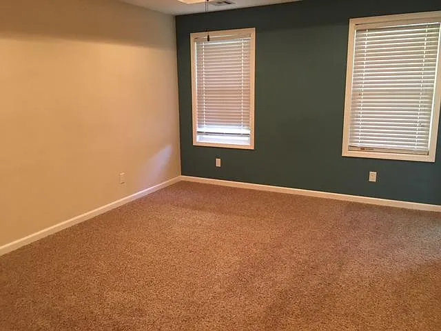 Master bedroom with a walkin closet on opposite side of thes