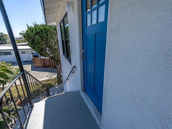 View of front door and stairs