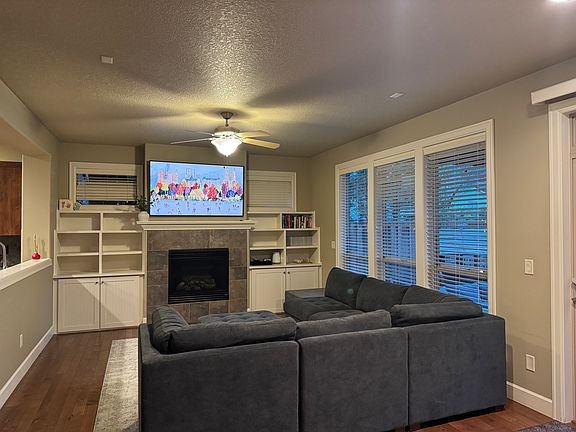 Downstairs - living room (gas fireplace and TV mount above)