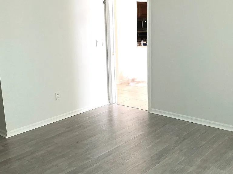 Primary bedroom luxury vinyl flooring, a walk-in closet and other closet. Primary bath has closet for towel and linens