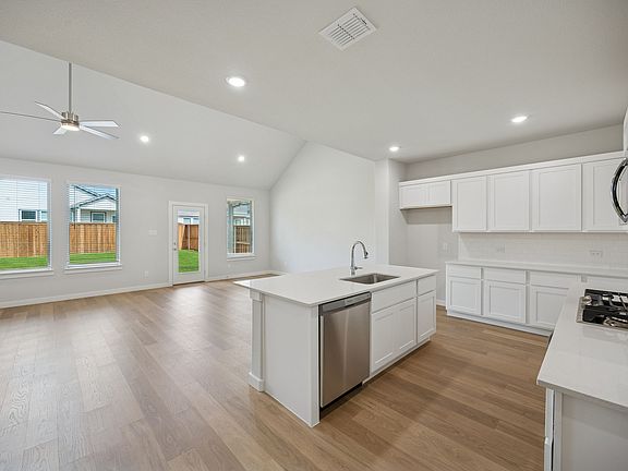 Open Floor Plan in the Masters home plan by Trophy Signature Homes - REPRESENTATIVE PHOTO