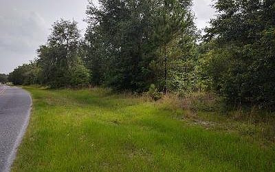 5th image of 802 NW Country Lake Dr
