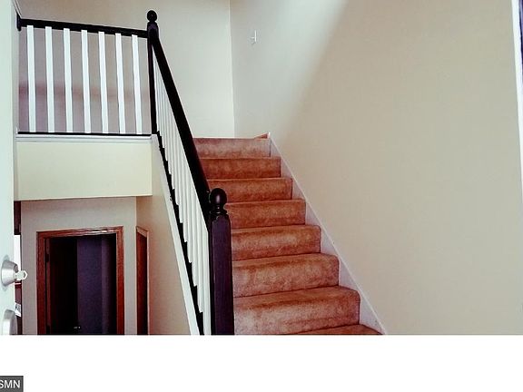 This split entry row home has a nice sized foyer to greet you with coat closet and 2 car att garge access.