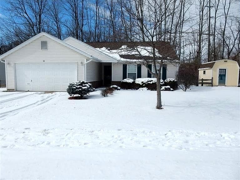 This was the model home for the neighborhood on a double corner lot.  This 3 BR ranch features 2 full baths and has many updates including hardwood floors,  vaulted ceilings in the great room and walk-in closets. The back deck/patio is very private and th