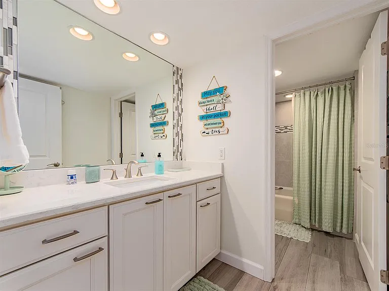 240 Sand Key Estates Dr #216 — Photo 28