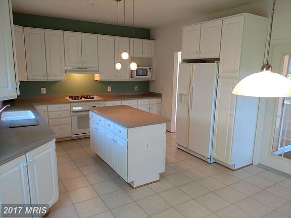 Huge kitchen with entry to porch