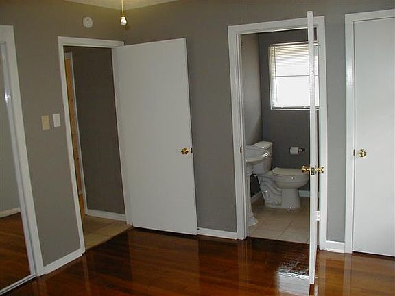 Master with 1/2 bath. Walk-in closet (right side) and sliding door closet.