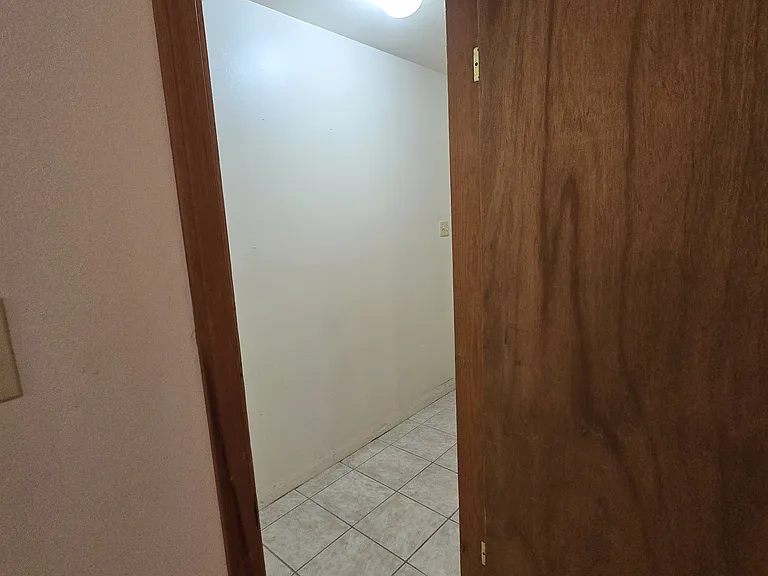 Entry from bedroom to laundry room