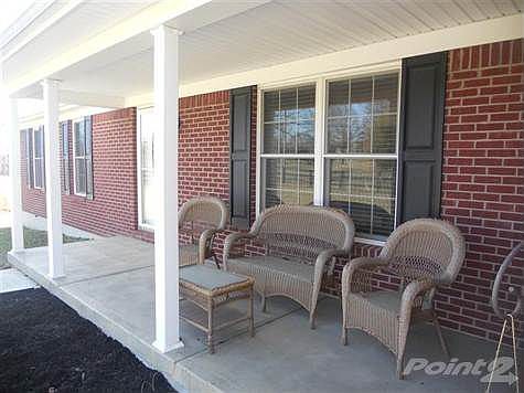 The front porch is wonderful for enjoying the afternoon shade and watching the world go by.