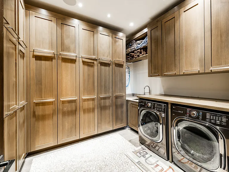 Main level laundry: 
Full size washer and dryer
storage cabinets