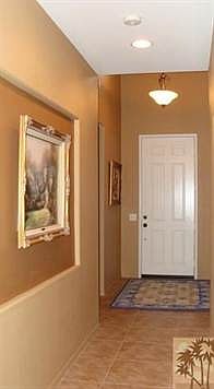 Entrance - 2 bedrooms and a bathroom are through the doorway on the left of this photo, between the two paintings.